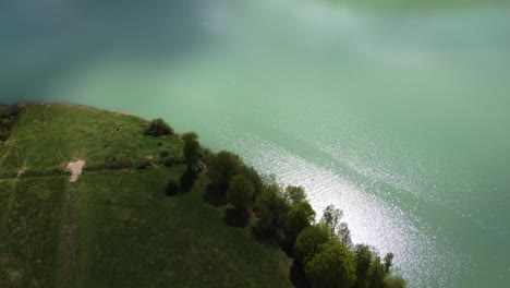 Drone-Shot-With-Turquoise-Water-At-Mountain-In-The-Spring