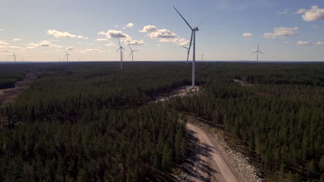 Renewable-Wind-Farm-Under-Construction,-Wind-Turbines-in-Boreal-Forest,-Aerial-Rising