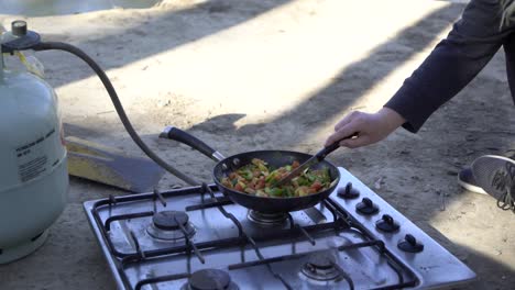 Pan-frying-veggies-stir-fry-camping-in-summer