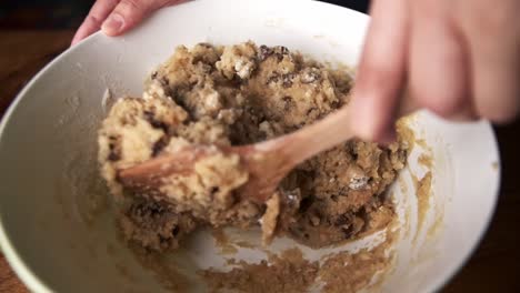 slow-motion-closeup-of-mixing-chocolate-cookie-dough-in-bowl