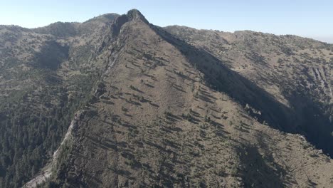 Orbit-around-small-mountain-with-drone