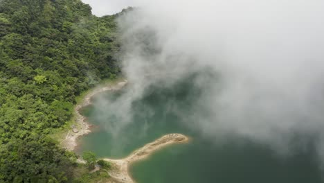 Top-View-Clouds-Over-Beautiful-Danao-Lake-In-Leyte,-Philippines---Aerial-Drone-Shot-Descending