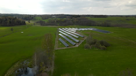Small-Private-Solar-Power-Plant-System-in-Field-on-Cloudy-Day,-Poland-Pieszkowo