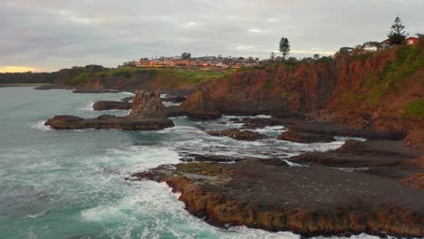 Aerial-view-of-Sandstone-Cliffs-And-Sea-Stacks-Of-Cathedral-Rocks-In-Kiama,-New-South-Wales-Australia