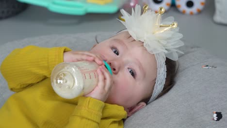 Baby-drinking-milk-close-up
