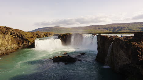 Dramatic-dolly-in-shot-of-the-Godafoss-Waterfalls-along-Icelands-Skjálfandafljót-river