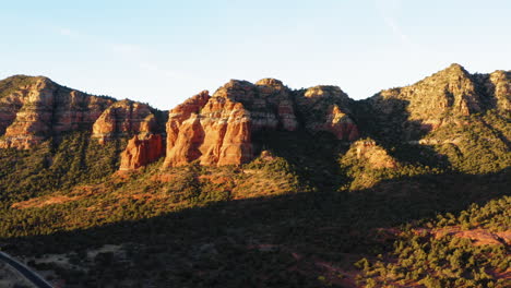 Scenic-mountain-valley-in-sunlight-at-Sedona---Arizona,-Usa-:-Aerial-drone-flying-shot