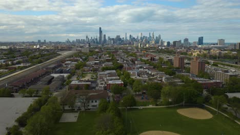 Aerial-View-of-Chicago's-South-Side-with-Skyline-in-Background