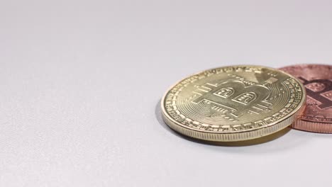 Panoramic-shot-of-bitcoins-on-a-white-surface