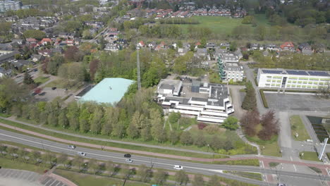 Aerial-of-Dutch-police-station-next-to-a-busy-road
