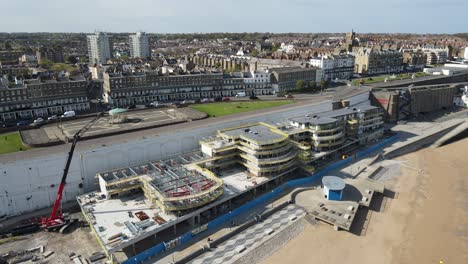 New-building-at-Ramsgate-Kent-UK-on-waterfront-beach-aerial-footage-4K