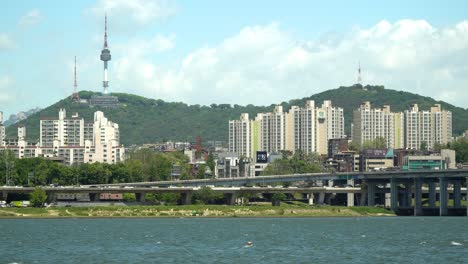 Seoul-landscape---Namsan-Tower-on-the-top-of-the-mountain-and-Han-river,-South-Korea