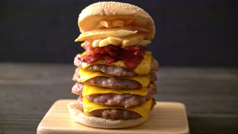 pork-hamburger-or-pork-burger-with-cheese,-bacon-and-french-fries