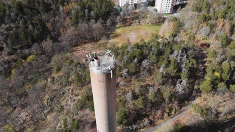 Top-of-a-heating-plant-Chimney,-Industrial-Concept,-Aerial-Tracking