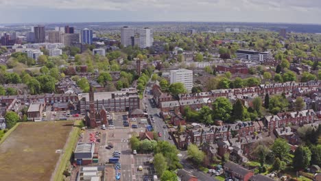 Aerial-drone-shot-over-top-of-suburban-British-housing-estate-in-Birmingham,-England