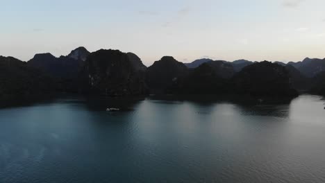 Overhead-drone-view-of-the-ocean-and-limestone-islands-of-Halong-Bay-Vietnam