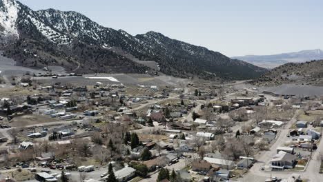 Panoramic-left-to-right-descending-aerial-view-over-the-town-of-Eureka-Utah-America
