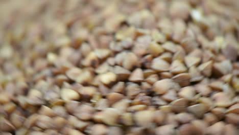 Buckwheat,-Macro-shot,-Buckwheat-on-table-spinning-to-right