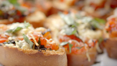 close-up-toasted-bread-brochetas-with-tomatoes,-garlic,-onion,-Mediterranean-diet,-carbs