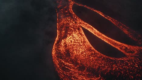 Drone-aerial,-lava-rivers-from-Pacaya-volcano-eruption-in-Guatemala