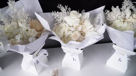 Beautiful-bouquet-of-white-roses-prepared-for-the-wedding