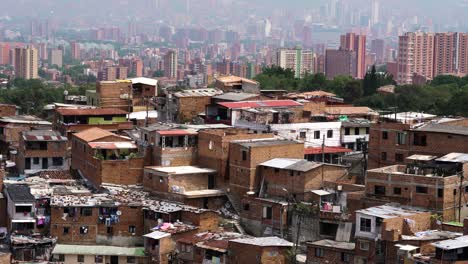 Time-Lapse-of-Unidentifiable-Shanty-Town-with-Tall-City-Buildings-in-Background