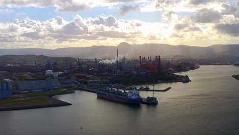 Panoramic-View-Of-The-Steel-City-Of-Wollongong-Australia-In-Sunset---aerial-shot