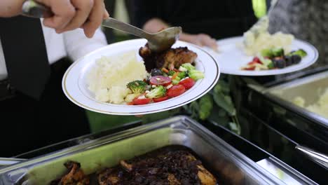 Wedding-food-catering,-event-hot-food-service,-main-meal-preparation-closeup