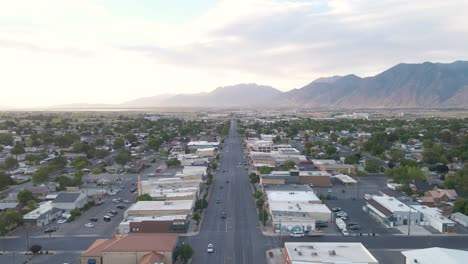Main-Street-in-the-Small-Town-of-Spanish-Fork,-Utah---Aerial-View-at-Sunset