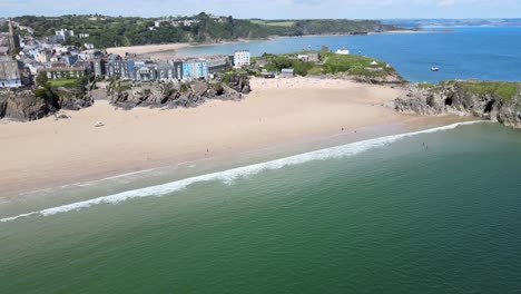 Tenby-South-Beach-sunny-summers-day-Pembrokeshire,-Wales,-Aerial-4K-footage