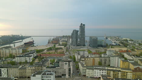 Aerial-view---Panorama-of-Gdynia---port-city-on-the-Baltic-coast-of-Poland,-Apartamenty-Sea-Towers-and-Marriot-hotel-on-Background
