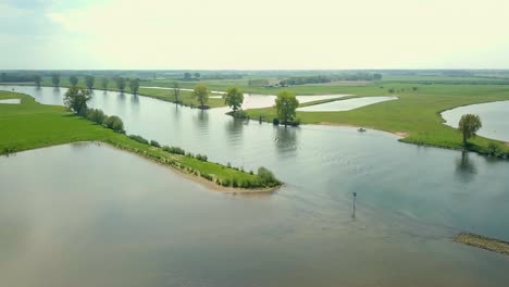 Aerial-drone-view-of-the-big-river-in-the-Netherlands,-Europe