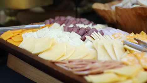 meat-and-cheese-charcuterie-Platter-during-wedding-event,-close-up