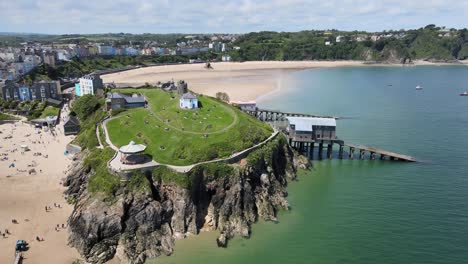 Tenby-Castle-and-lifeboat-house-Seaside-town-in-Pembrokeshire,-Wales,-drone-4K-footage