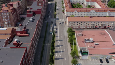 Street-lanes-aerial-road-in-central-Gothenburg-Swedish-city-Sweden-car-driving-horizon-skyline-architecture-old-historic-buildings-apartment-offices-sunny-summer-parking-lot-freeway-heavy-traffic-bird