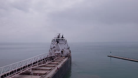 Deck-Of-MV-Sam-Laud-Bulk-Carrier-Dock-In-The-Harbour-With-Seascape-Covered-In-Fog