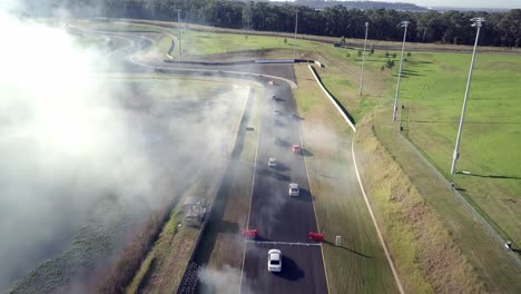 Aerial-View-Of-Cars-Drag-Racing-At-Sydney-Motorsport-Park-During-Daytime---drone-shot