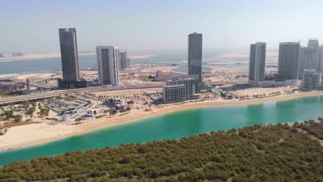 Aerial-pan-left-shot-of-Al-Reem-Island-landscape