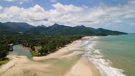 Time-lapse-of-Cumulus-Clouds-Forming-Over-Mountains-and-beach-and-river-estuary-on-the-tropical-island-of-Koh-Chang
