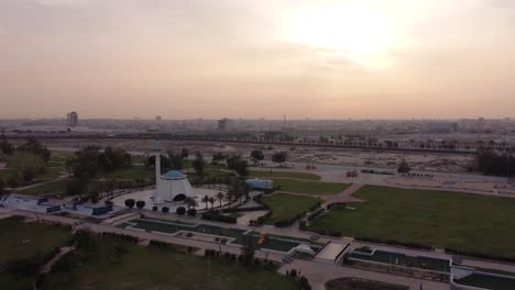 Architecture-buildings-of-Life-park-in-Dammam-city,-ascending-drone-view
