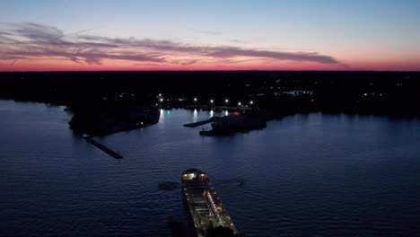 Sam-Laud-Freighter-Sailing-Near-The-Kingsville-Harbour-During-Sundown-In-Ontario,-Canada