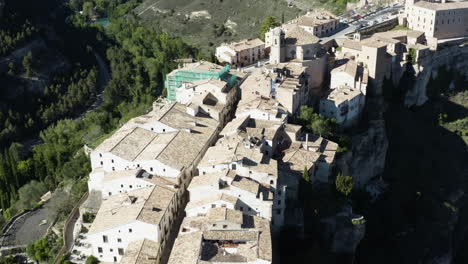 Cliffside-Houses-on-Beautiful-Mountain-in-Cuenca,-Spain---Aerial
