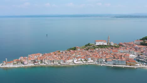Aerial-View-Of-Piran-Town-And-Calm-Blue-Sea-In-Slovenia