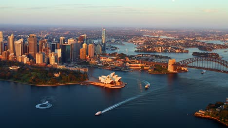 Aerial-View-of-Sydney-Port-Jackson-Bay-during-Early-Morning-with-Ferry-Boats-Cruising,-NSW-Australia