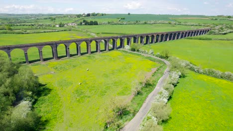 Aerial-Of-Welland-Viaduct---Bird's-Eye-View-Of-Green-Fields-And-Harringworth-Viaduct-In-Countryside-Land-Of-England,-UK