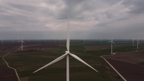 Aerial-View-Of-Clean-And-Renewable-Wind-Power-Farm-On-A-Cloudy-Day