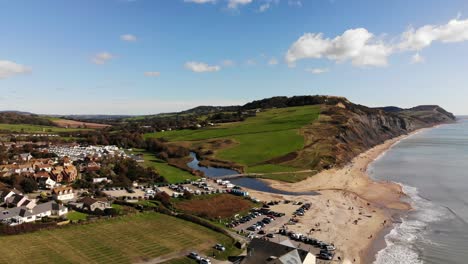 Aerial-View-Of-Charmouth-Beach-Towards-Cliffs-In-Dorset