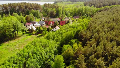 Small-Village-With-Vibrant-Green-Lush-Foliage-In-Styporc,-Chojnice-County,-Pomeranian-Voivodeship-In-Northern-Poland