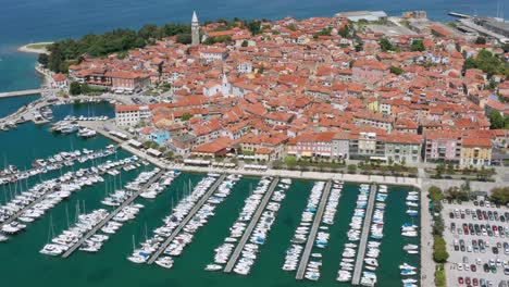 Aerial-View-Of-Waterfront-Town-Of-Izola-In-Slovenia-With-Marina-And-St