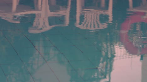 Reflection-of-chairs-at-the-swimming-pool